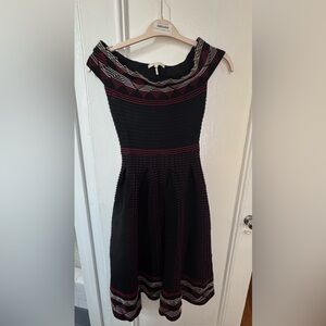 Beautiful off the shoulder Maje midi dress